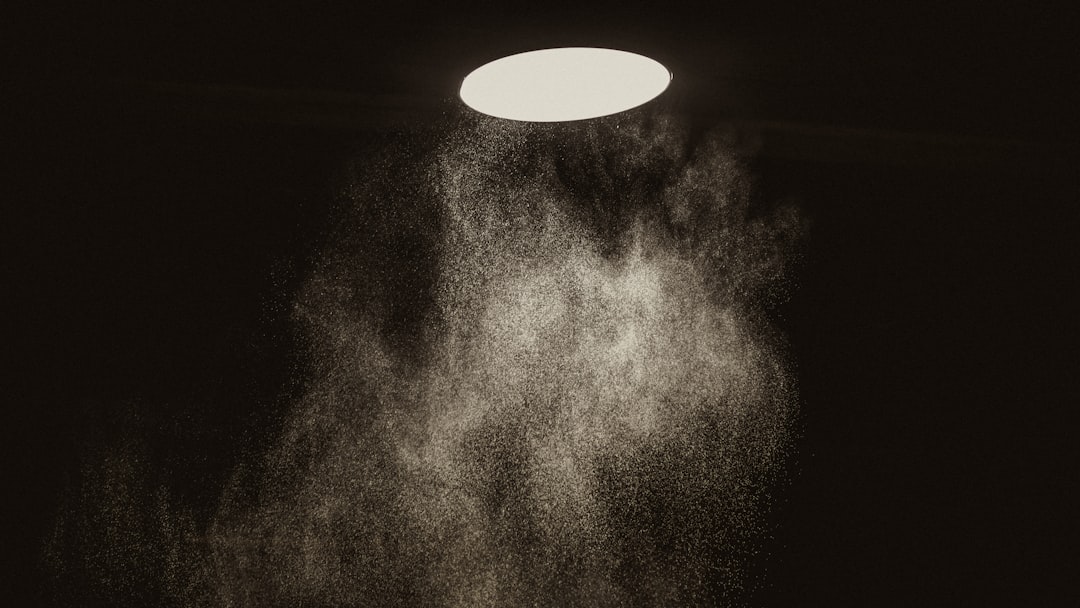 Photo by Daoud Abismail grayscale photo of moon in dark night sky